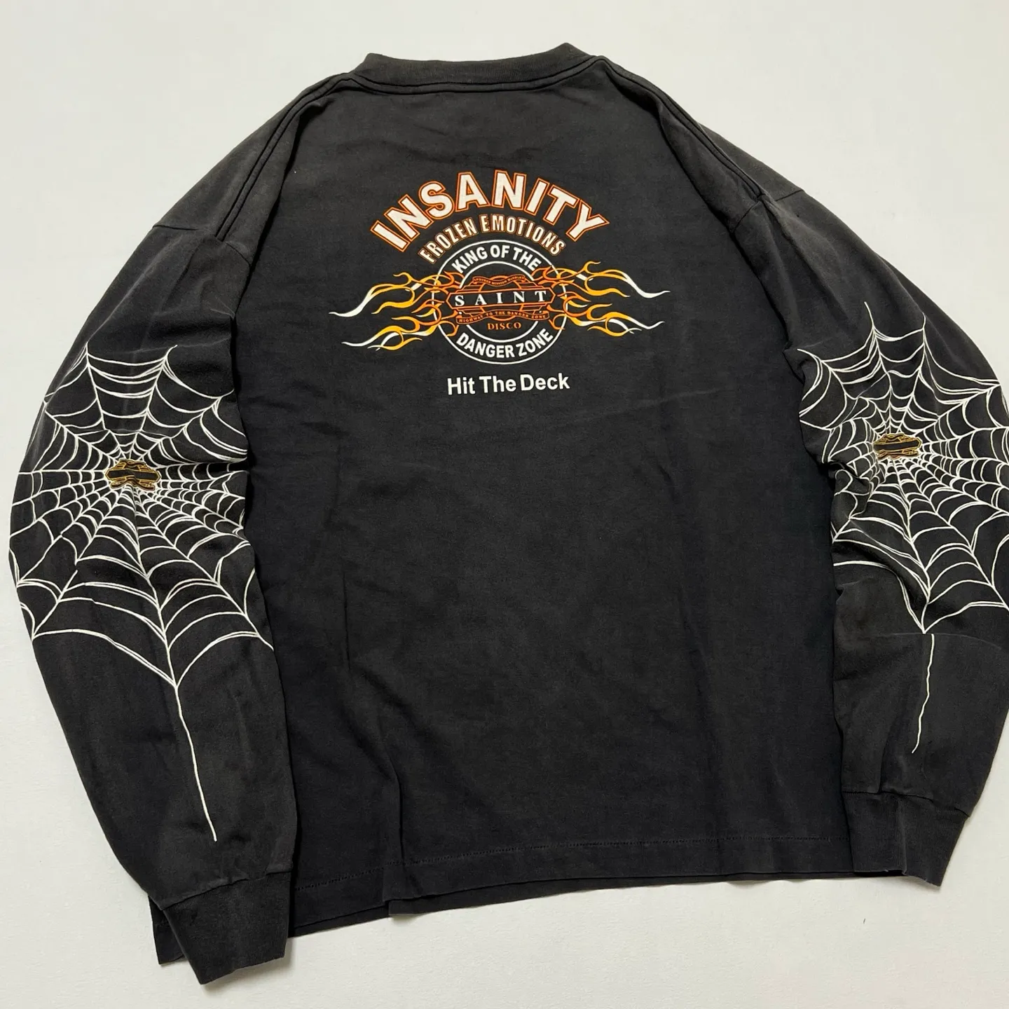 SAINT Mxxxxxx × TEFLON DISCO ML_LS TEE/INSANITY/BLK Spider Web INSANITY Distressed Long Sleeves Washed Black S-XL Ready-to-wear Assute dyeing Maliu water spray fading treatment Customized TEFLON DISCO co-branded accessories Hand-splashed ink Wormhole fraying treatment Authentic level printing process